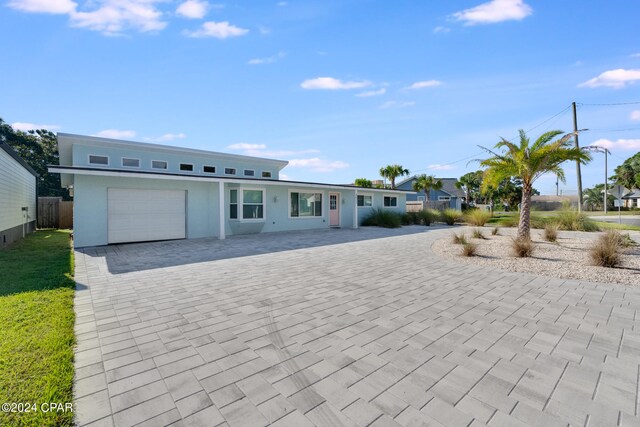 ranch-style house with a garage