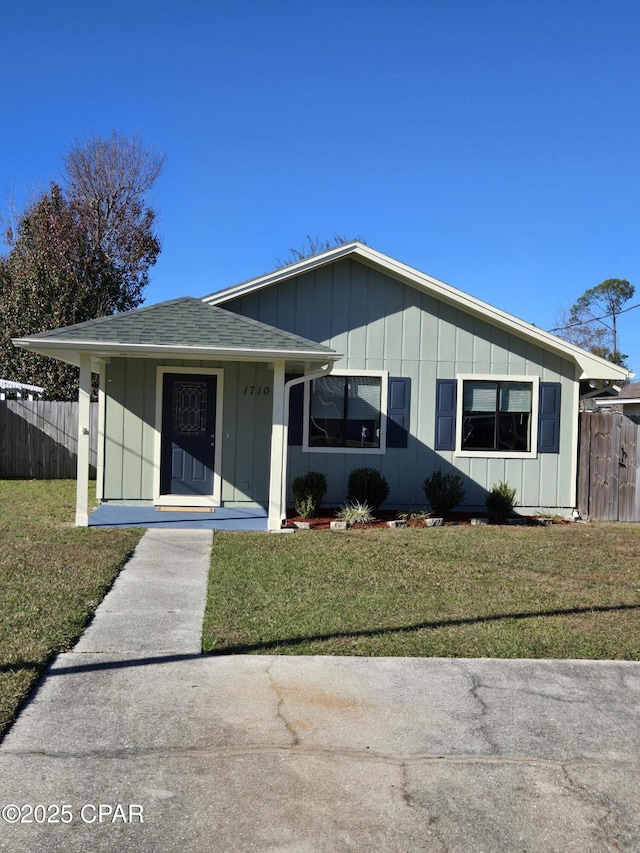 view of front of home with a front yard