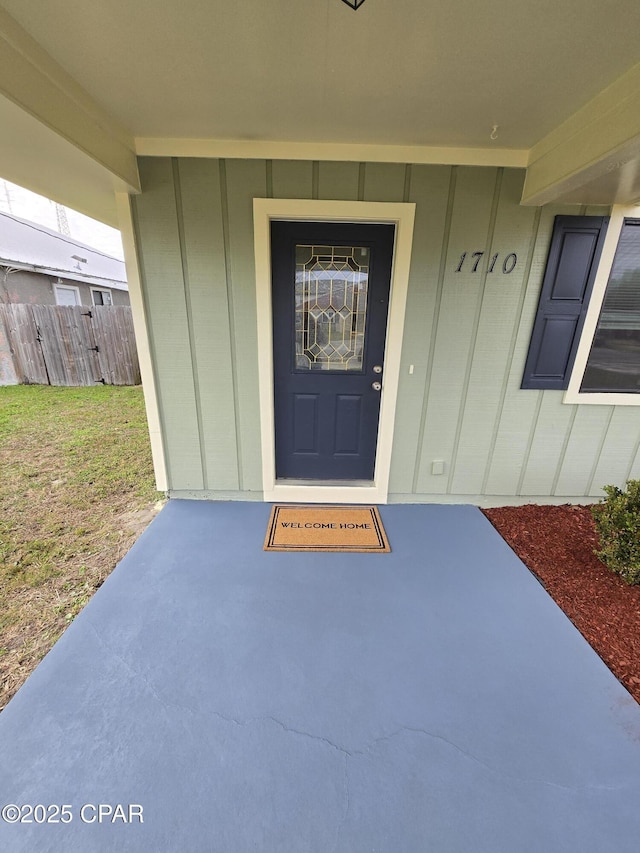 entrance to property with covered porch