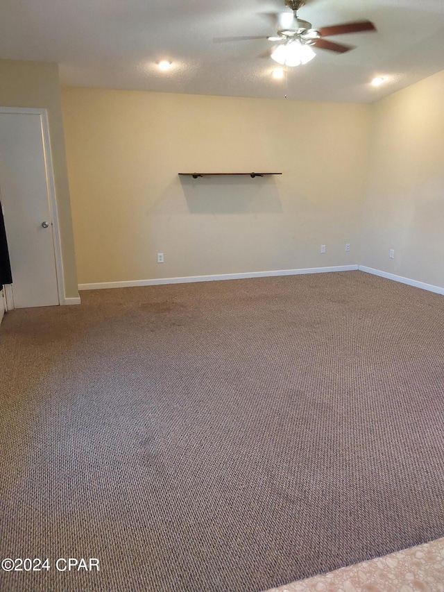 unfurnished room featuring ceiling fan