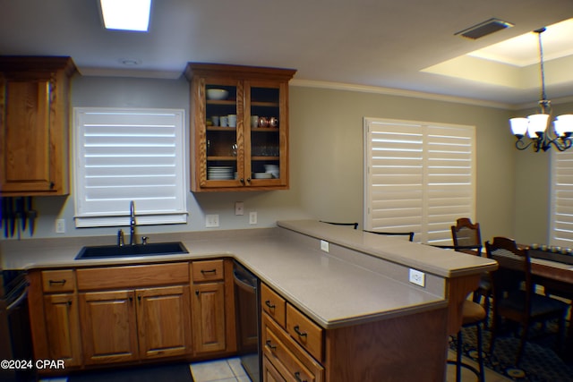 kitchen with a chandelier, sink, stainless steel dishwasher, crown molding, and decorative light fixtures