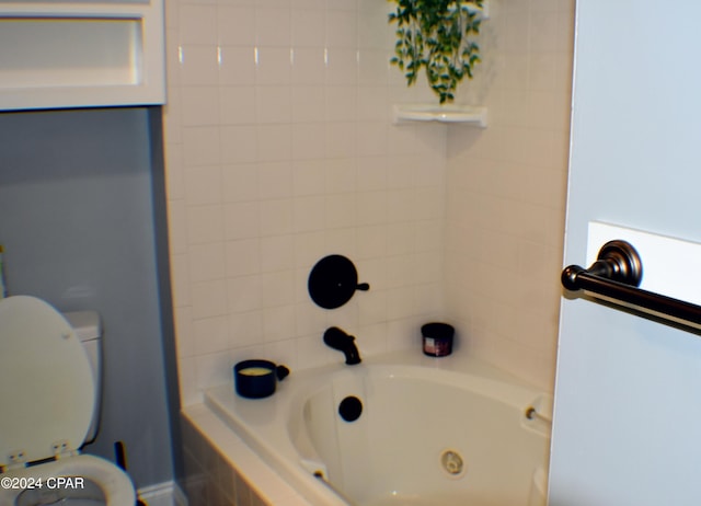 bathroom featuring toilet