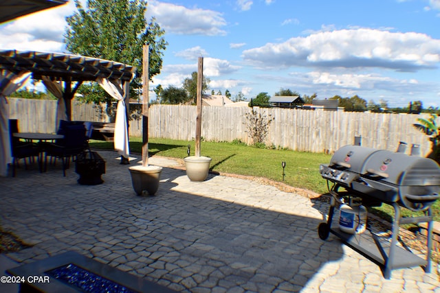 view of patio / terrace featuring grilling area and a pergola