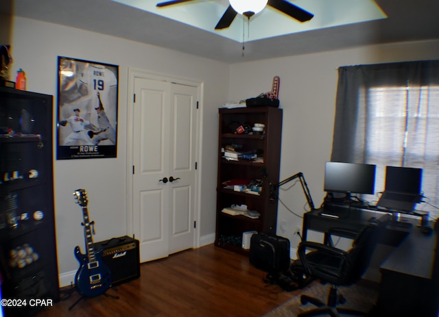 office area with dark hardwood / wood-style floors and ceiling fan