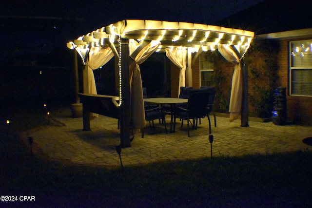 view of patio at twilight