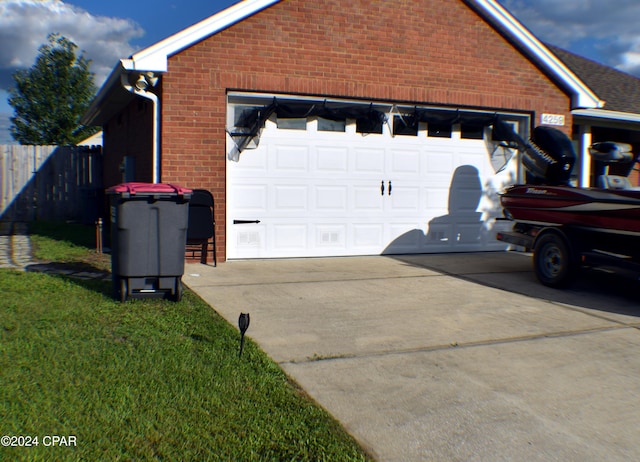 garage with a lawn