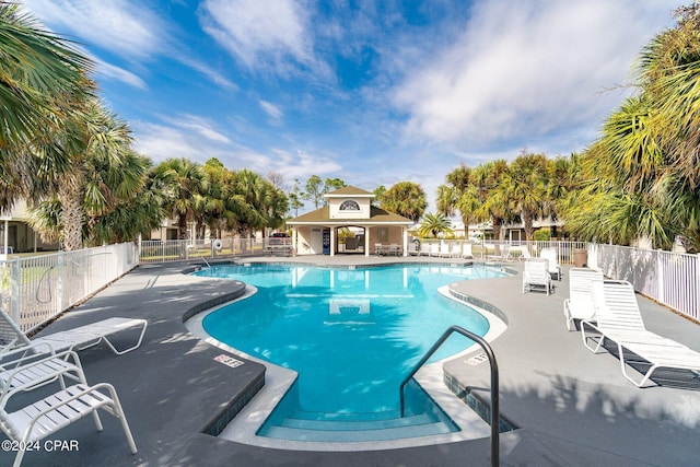 view of swimming pool with a patio area