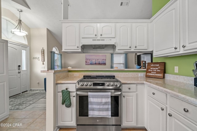 kitchen featuring kitchen peninsula, pendant lighting, white cabinetry, and stainless steel electric range