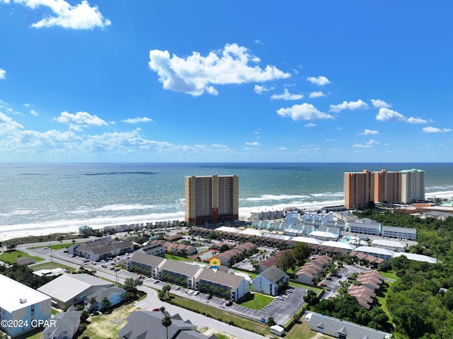 birds eye view of property featuring a water view and a view of the beach