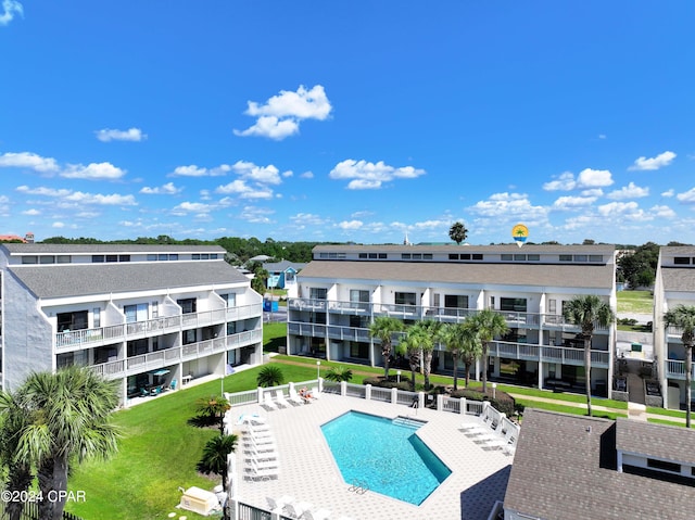 view of swimming pool featuring a patio area