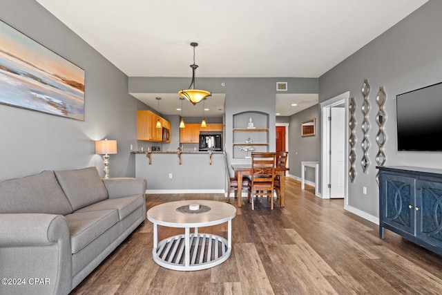 living room with hardwood / wood-style flooring