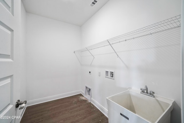 laundry area with hookup for an electric dryer, washer hookup, dark hardwood / wood-style floors, and sink