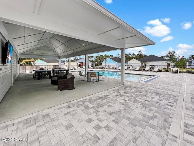 view of swimming pool featuring a patio