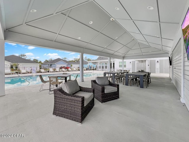 view of patio / terrace featuring a fenced in pool