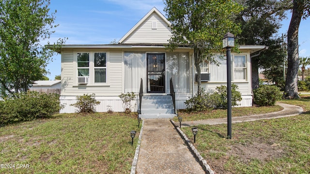 view of front of home with a front yard