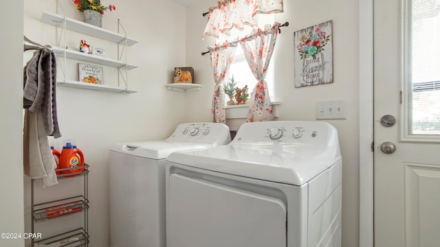 laundry room with washer and clothes dryer