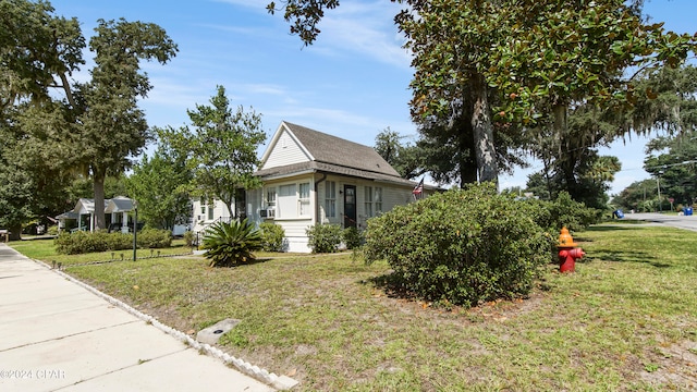 view of property exterior featuring a yard