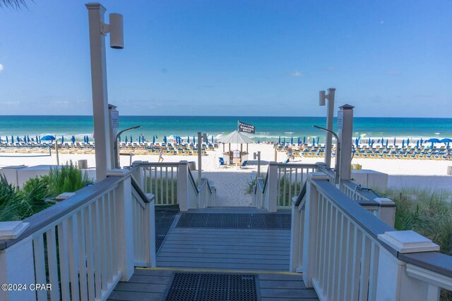 property view of water featuring a beach view