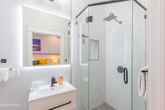 bathroom with vanity and walk in shower