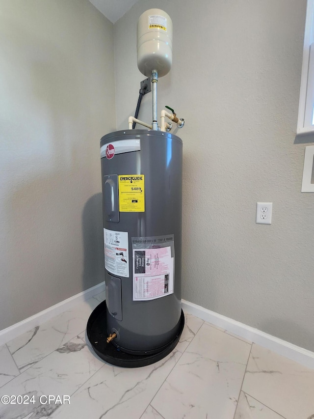 utility room with water heater