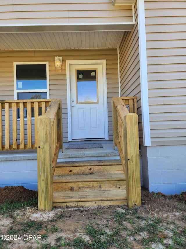 property entrance with a porch