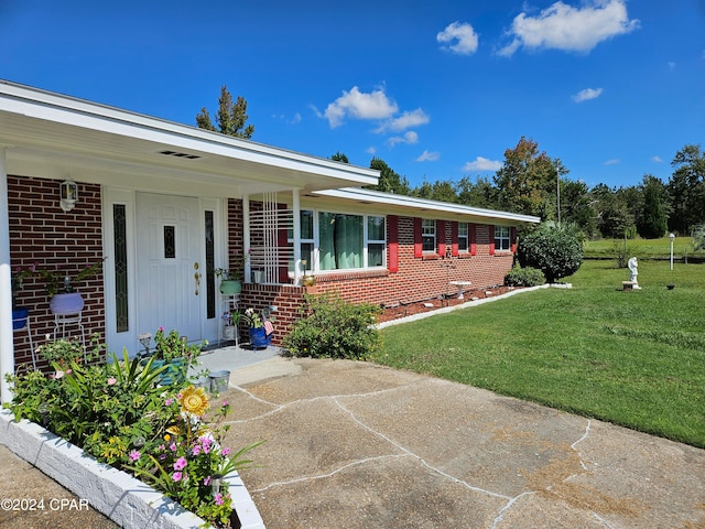 view of front of house with a front yard