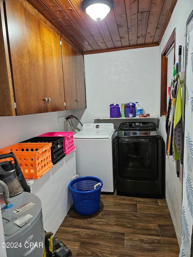 laundry area with cabinets, wooden ceiling, dark hardwood / wood-style flooring, crown molding, and washer and dryer