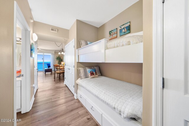 bedroom with light hardwood / wood-style floors