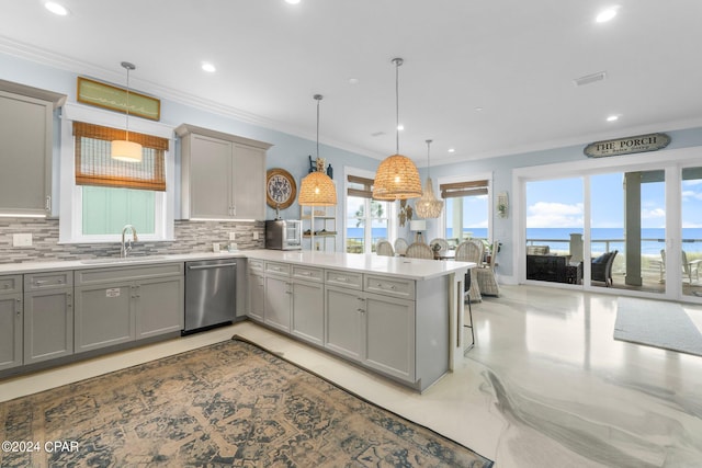 kitchen featuring a water view, kitchen peninsula, dishwasher, and pendant lighting