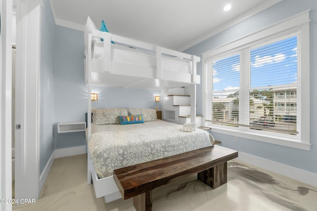 bedroom with ornamental molding