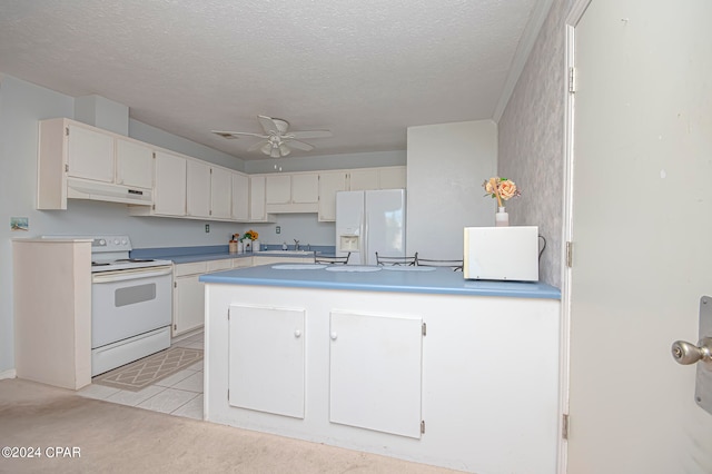 kitchen featuring ceiling fan, a textured ceiling, light tile patterned flooring, sink, and white appliances