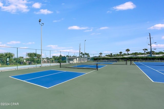 view of tennis court with basketball court