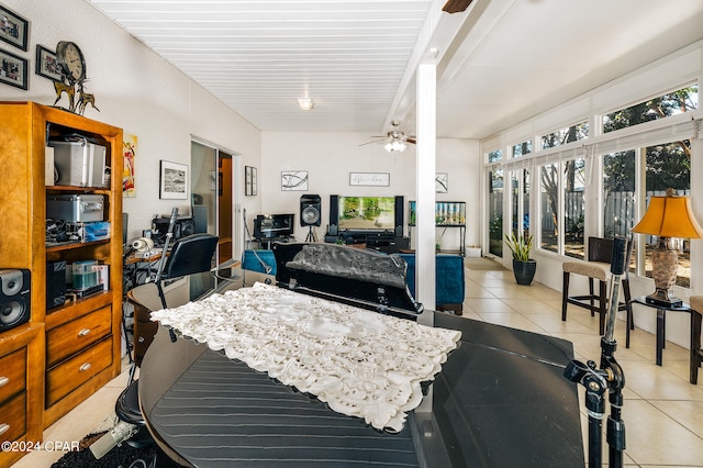 interior space with multiple windows and light tile patterned floors