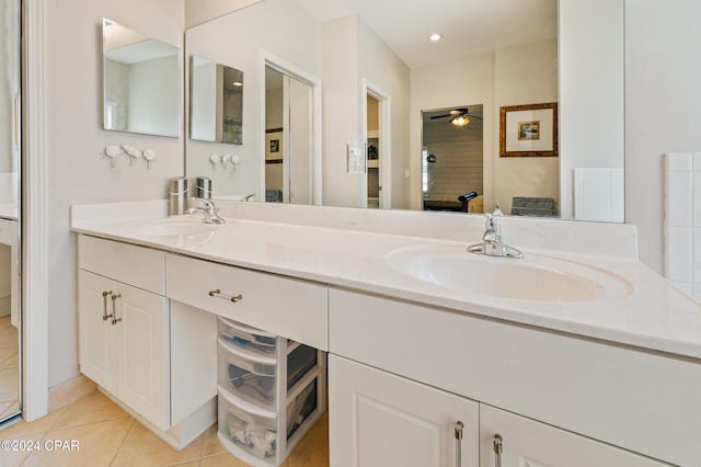 bathroom featuring vanity, tile patterned floors, and ceiling fan