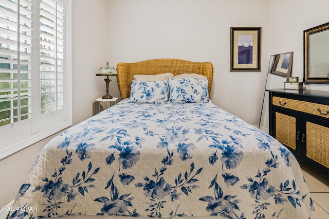 bedroom with multiple windows