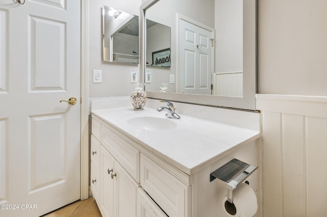 bathroom with vanity and tile patterned floors