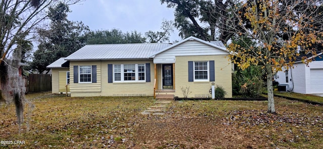 single story home featuring cooling unit