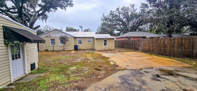 back of property featuring a patio