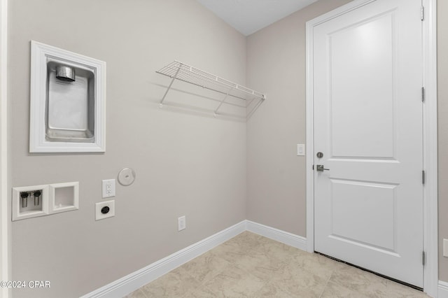 laundry room with laundry area, baseboards, hookup for a washing machine, electric dryer hookup, and hookup for a gas dryer