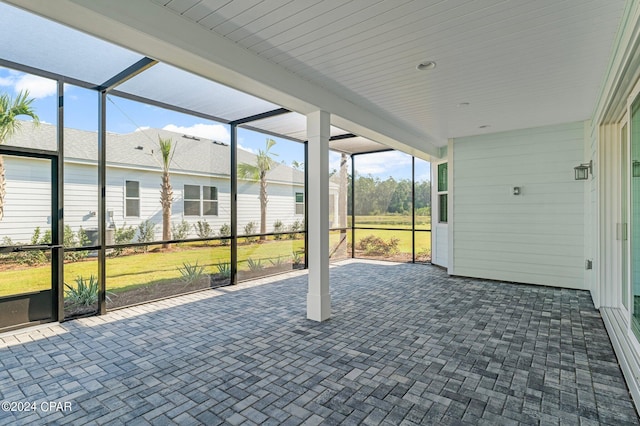 unfurnished sunroom featuring a healthy amount of sunlight