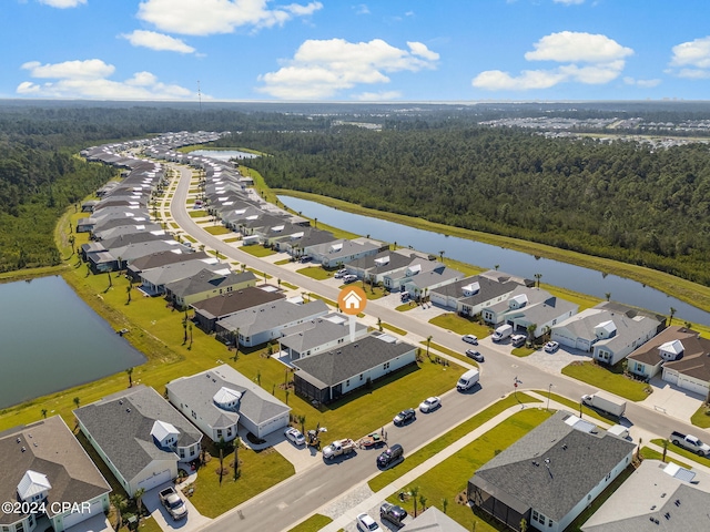 drone / aerial view with a water view