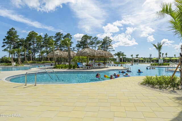 community pool with a patio