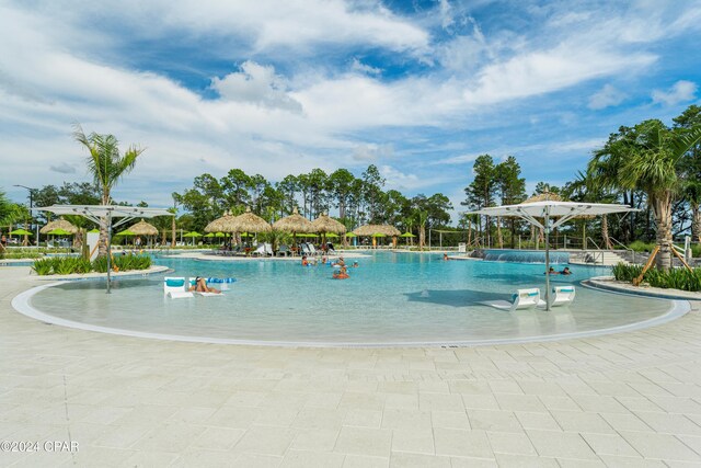 view of pool featuring pool water feature