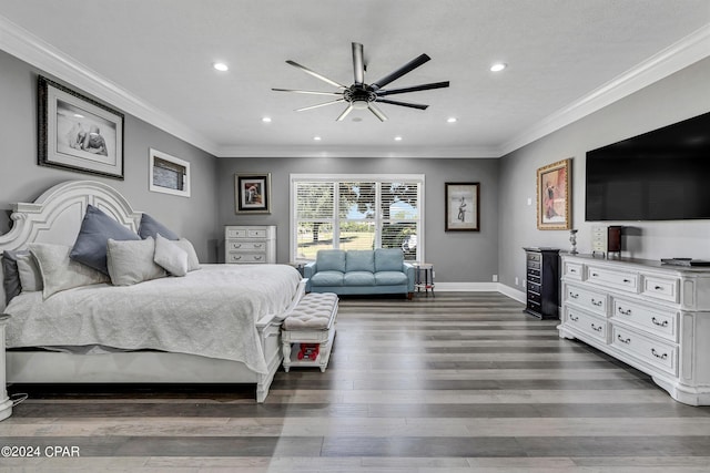 bedroom with ceiling fan, dark wood-type flooring, and crown molding