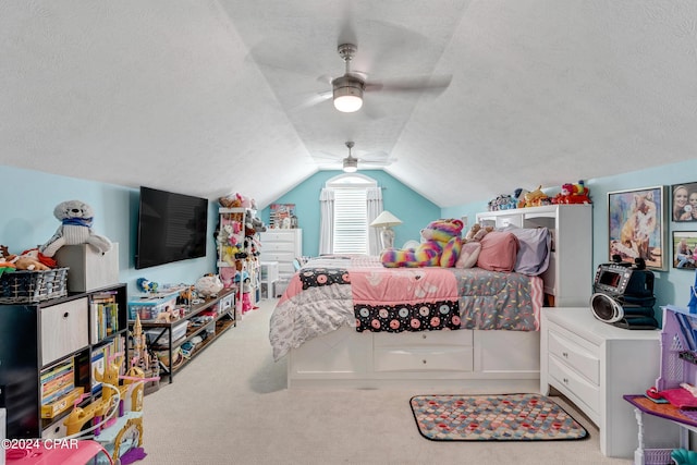 carpeted bedroom featuring ceiling fan, a textured ceiling, and vaulted ceiling