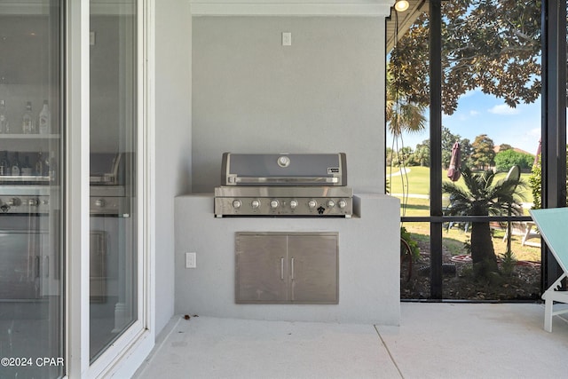 view of patio featuring area for grilling and grilling area