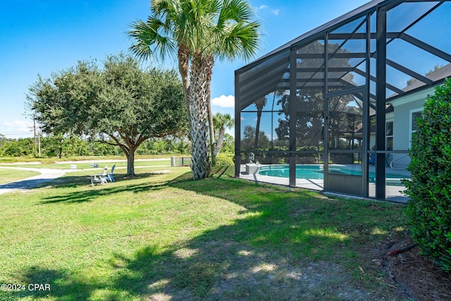 view of yard featuring a lanai