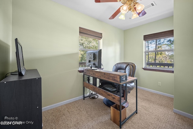 office featuring light carpet, plenty of natural light, and ceiling fan