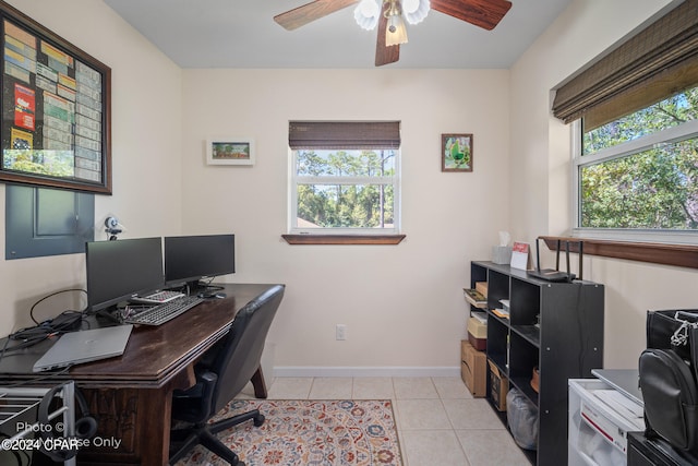 office space featuring light tile patterned floors and ceiling fan