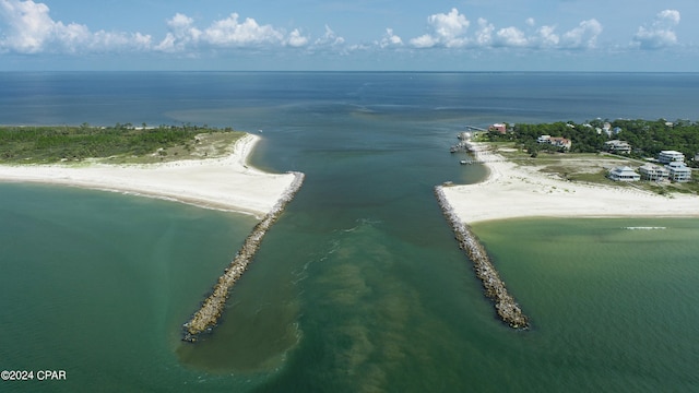 bird's eye view with a water view and a view of the beach